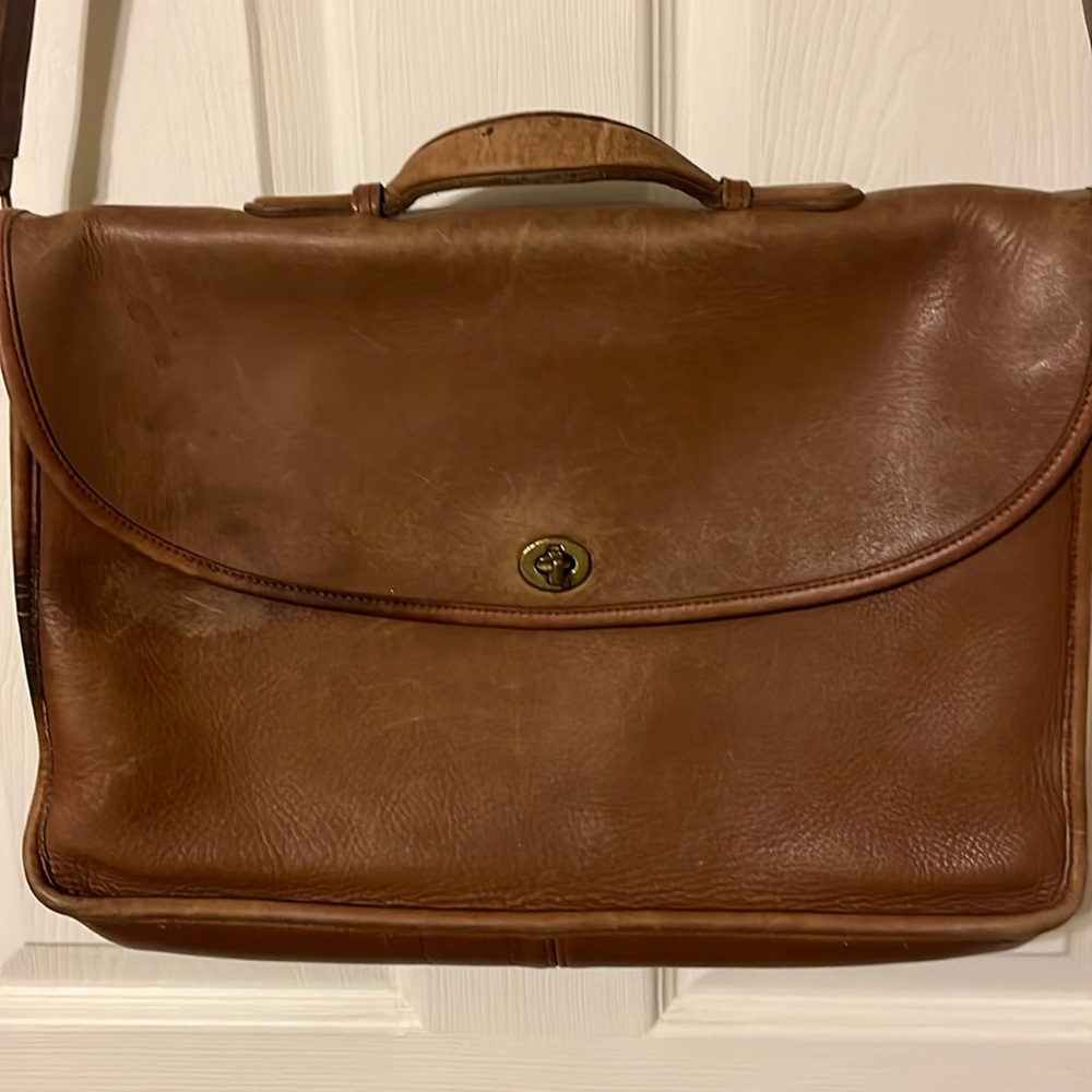Coach vintage briefcase! Has staining on front. Inside is fairly clean.
